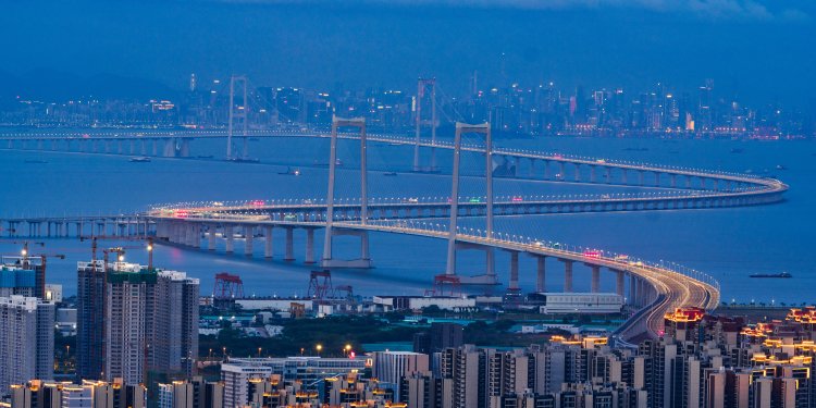 Shenzhen-Zhongshan Link suspension bridge construction showing 270-meter towers